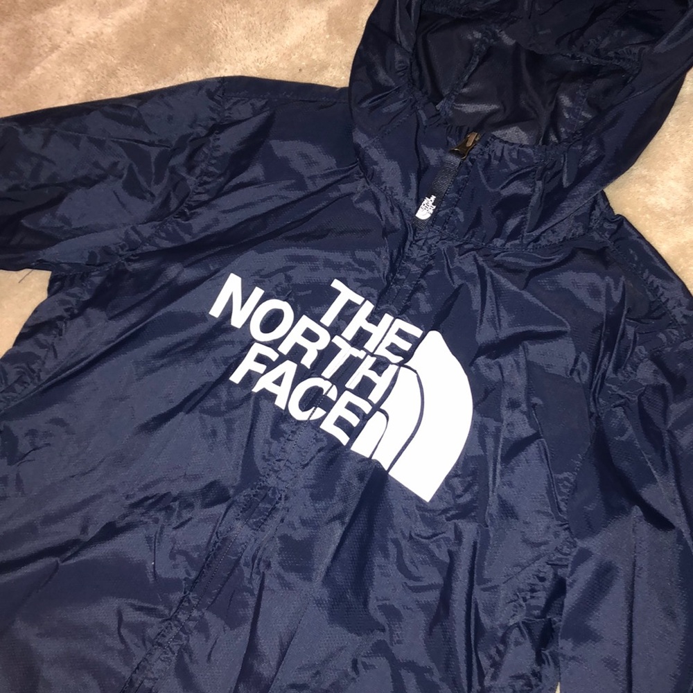 Never worn The North Face rain jacket